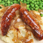 lincolnshire sausages in onion gravy, mashed potato, green beans & carrots